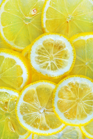 fresh lemon, background from lemon, sliced of lemon
