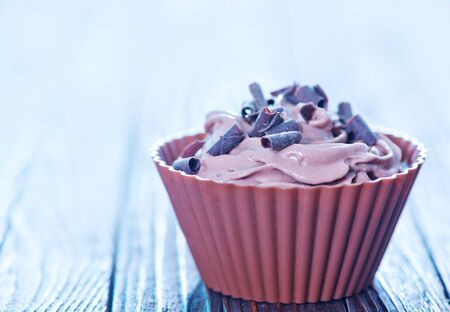 chocolate cream in brown form for muffinsの写真素材