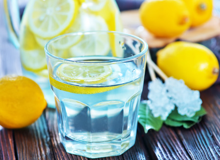 lemonad in glass and on a tableの写真素材