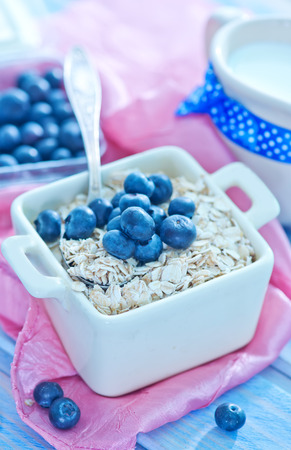 oat flakes with blueberry in the bowlの写真素材