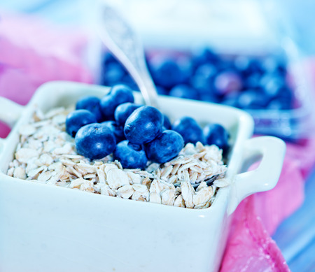 oat flakes with blueberry in the bowlの写真素材
