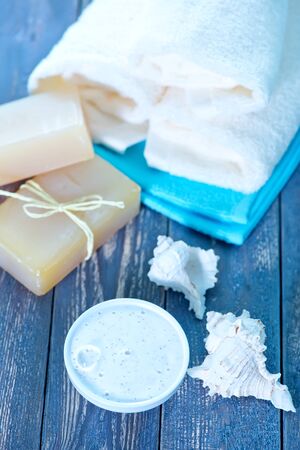 Soap and Body Lotion on the Wooden Backgroundの写真素材