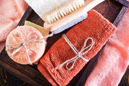 clear towels and aroma soap in the wooden boxの写真素材