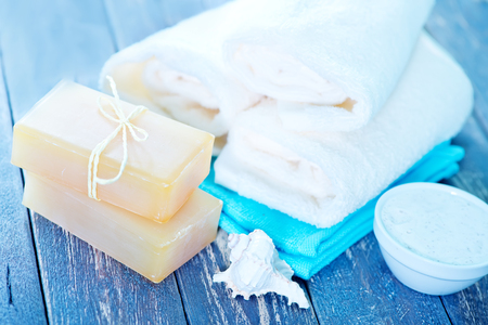 Soap and Body Lotion on the Wooden Backgroundの写真素材