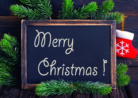 background from christmas tree on wooden backgroundの写真素材