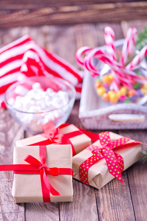 christmas decoration and christmas candy on a tableの写真素材