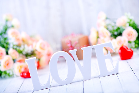 Valentine's day concept with gift box and letters "love"の写真素材