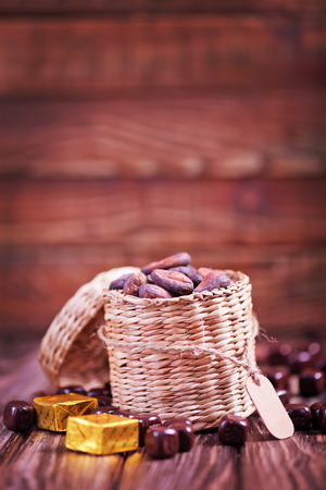 cocoa beans on the wooden table, dry cocoa beansの写真素材
