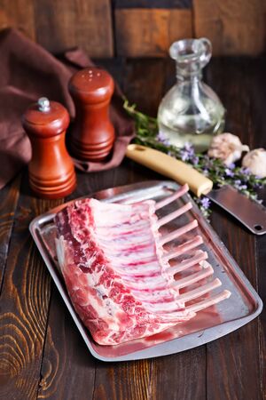 raw meat with spice and herb on a tableの写真素材