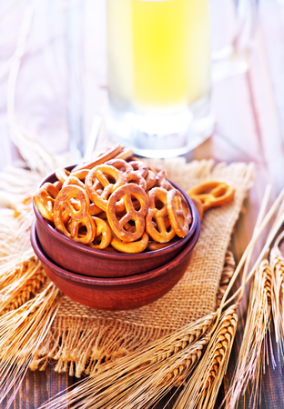 pretzels for beer in the bowl on a tableの写真素材