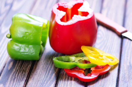 color sweet pepper on the wooden tableの写真素材