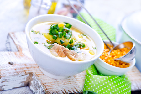 lentil soup in bowl and on a tableの写真素材