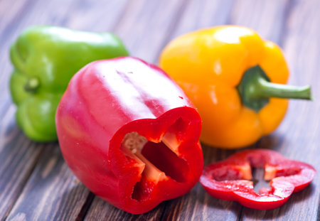 color sweet pepper on the wooden table