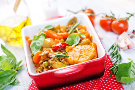mix vegetables in bowl and on a tableの写真素材