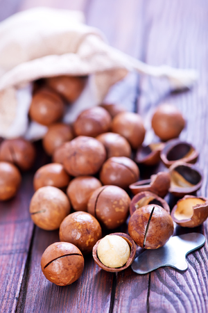 macadamia on a table, nuts in bag and on a tableの写真素材