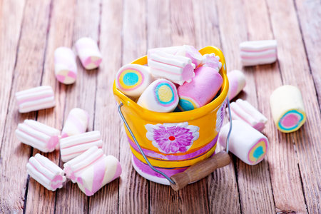 marshmallow on the wooden table, color marshmallow
