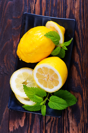 fresh lemon with mint  on the plateの写真素材