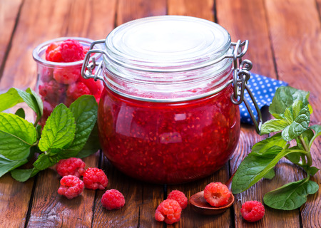 fresh raspberry and jam in glass bankの写真素材
