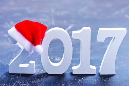 2017 white figures on a table, christmas background