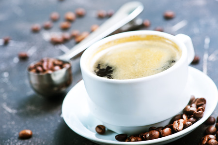 coffee in cup and on a tableの写真素材