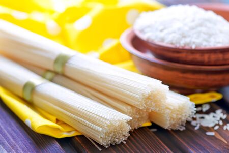 rice noodles and rice on a tableの写真素材