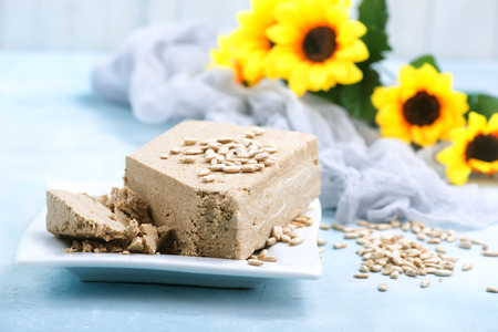 halva on plate and on a tableの写真素材