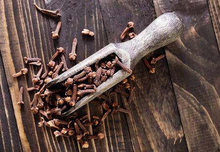 cloves on a table, aroma spice on a tableの写真素材