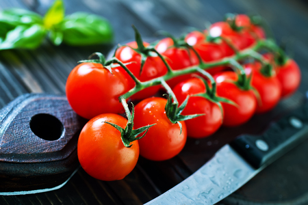 fresh tomato, cherry tomato on a tableの写真素材