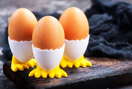 boiled chicken eggs on the wooden table