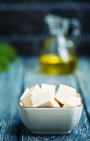 tofu cheese on plate and on a tableの写真素材
