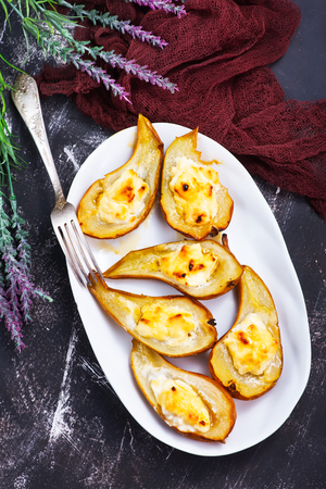 sweet baked pears with cheese, pears with ricottaの写真素材
