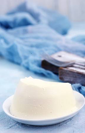 ricotta in bowl and on a tableの写真素材