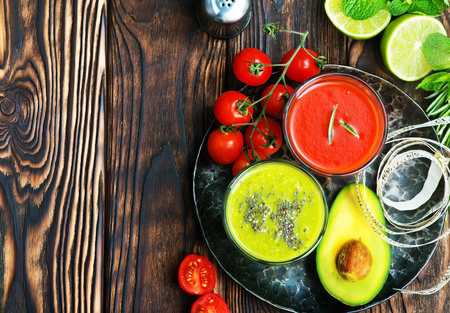 smoothies in glass and on a tableの写真素材