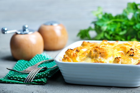 gratin with cauliflower and cheese on a tableの写真素材
