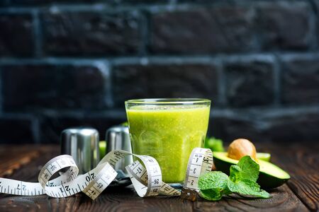 smoothie from avocado with chia seeds in the glassの写真素材