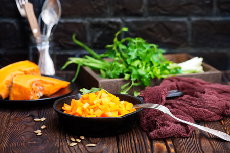 fresh pumpkin on wooden  the kitchen tableの写真素材