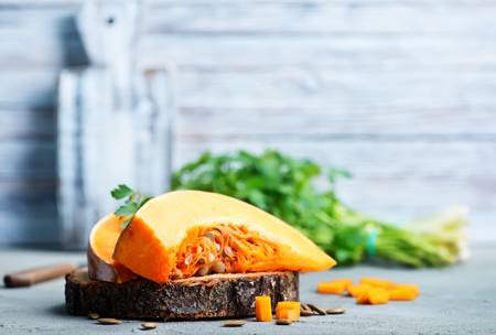 raw pumpkin on a table, fresh pumpkinの写真素材