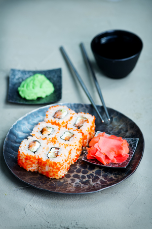 sushi with fresh fresh fish on the boardの写真素材