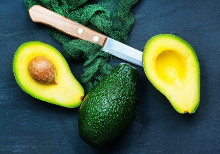 fresh avocado on a table, green avocado