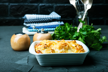 baked cauliflower with eggs in the bowlの写真素材