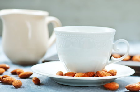 almond milk in cup on a tableの写真素材