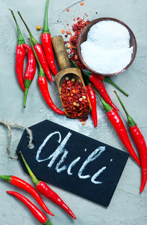 chilli peppers on the table, red hot peppersの写真素材