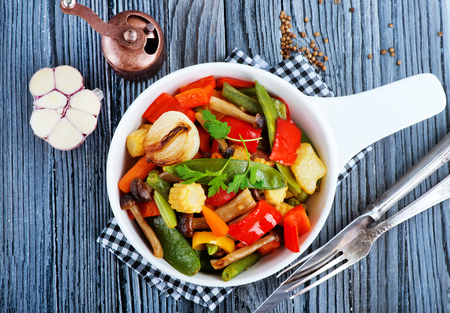 mix vegetables in bowl and on a tableの写真素材
