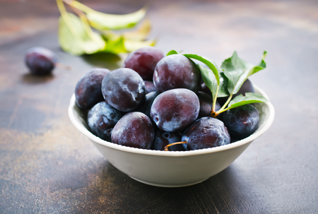 fresh plums on a table, stock photoの写真素材
