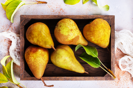 fresh pears on a tableの写真素材