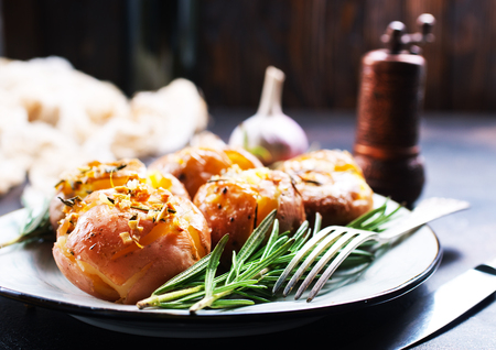 baked potato with spice and rosemary, baked potato with saltの写真素材