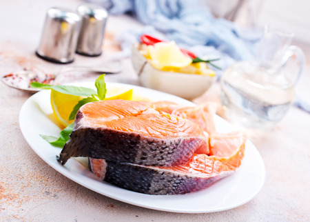 raw salmon fish with salt and spiceの写真素材