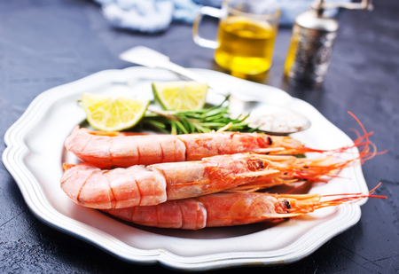boiled shrimps on plate, shrimps with salt and lemonの写真素材