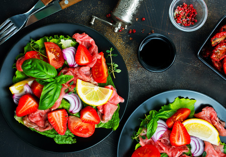 salad with fresh strawberry carpaccio vegetables, stock photoの写真素材