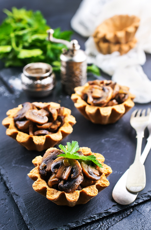 tartalets with fried mushrooms, fried mushrooms in tartaletsの写真素材